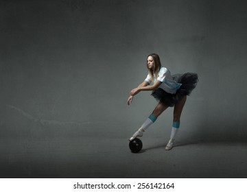 Nice Ballerina With Tutu Playing Football