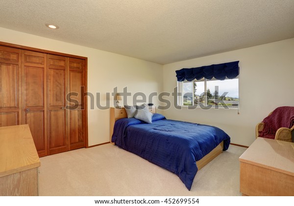 Nice Bedroom Creamy Tones Blue Bedding Stock Photo Edit Now