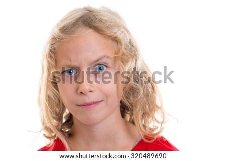 nice blond girl looking skeptical with eyebrow up