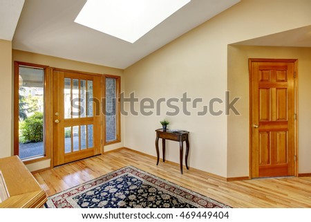 Nice bright entry way to home with hardwood floor and rug. Nortrhwest, USA