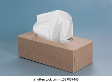 Nice brown tissue paper box on blue background