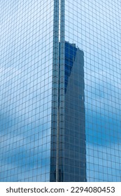 nice building reflection on the window of a tower