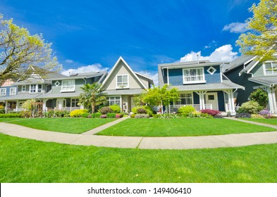 Nice And Comfortable Neighborhood. A Row, Line Of The Houses, Homes In The Suburbs Of The North America. Canada.