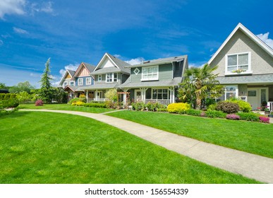 Nice And Comfortable Neighborhood. A Row, Line Of The Houses, Homes In The Suburbs Of The North America. Canada.