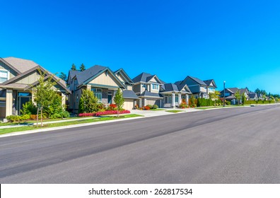 Nice And Comfortable Neighborhood. Some Homes On Empty Street In The Suburbs Of The North America. Canada.