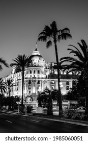 Nice, Cote D'Azur, France - March 2019: Negresco Hotel At Twilight On The French Mediterranean Riviera In Black And White