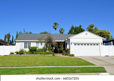  Nice cottage with a gable roof and lawn. LA, CA.