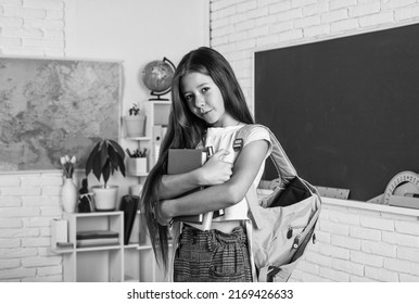 Nice Day. College Student In Classroom. Teen Girl Carry Backpack And Books.