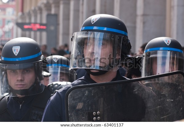 NICE, FRANCE - OCTOBER 16: French police control\
the street of nice during a  student  protest against school reform\
proposed by the french government, Nice the 16 of october 2010,\
France