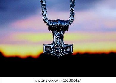 A Nice Mjölnir In Front Of Heaven