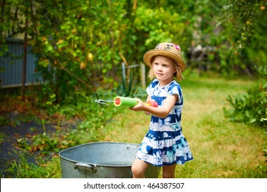 Nice Girl Playing With Water Gun