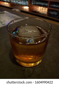 A Nice Glass Of Whiskey With A Spherical Ice Cube