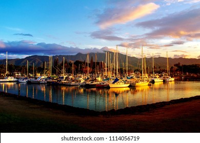 Nice landscape at the harbor of Haleiwa town and beautiful mountain background and reflection of water at golden hour in the Northshore of Oahu island, Hawaii USA - Powered by Shutterstock