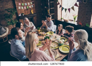 Nice lovely cheerful cheery family small little brother sister enjoying domestic festive event gathering meeting clapping palms morning day life in loft industrial interior