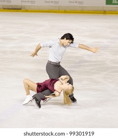 NICE - MARCH 26: Canadian Ice Dancers Kaitlyn Weaver And Andrew Poje Skate During Official Practice At The ISU World Figure Skating Championships On March 26, 2012 In Nice, France