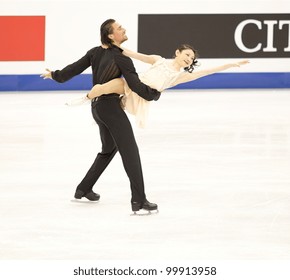 NICE - MARCH 28: Yuko Kavaguti And Alexander Smirnov Of Russia Perform Their Short Program At The ISU World Figure Skating Championships, Held On March 28, 2012 In Nice, France