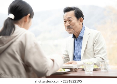 Nice middle couple enjoying their meal - Powered by Shutterstock