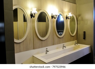 Nice Mirror And Basin In Public Restroom