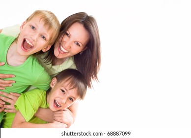 Nice Mom And Children On A White