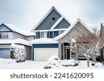 Nice neighborhood in cold,chilly and frosty winter time covered with snow . Vancouver, Canada.Big luxury house in snowfall cold. Nice and comfortable neighborhood, community in winter time