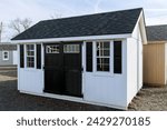 a nice new gray storage shed nature door tool spring trees outside window style farm