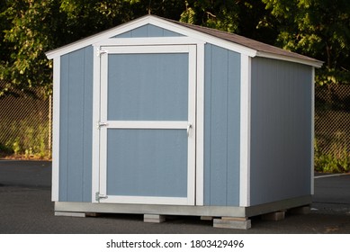 A Nice New Gray Storage Shed Wooden Door