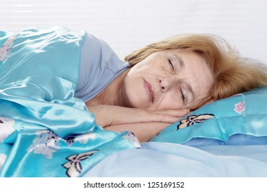 Nice Older Woman Sleeping In The Room