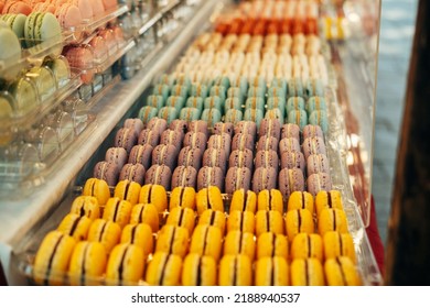 A nice photo of some macaroons standing at the window - Shutterstock ID 2188940537