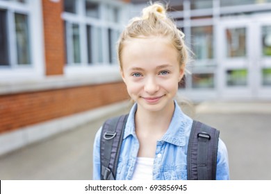 A Nice Pre-teen boy outside at school having good time - Powered by Shutterstock