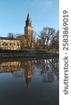 Nice river view with one of the oldest church in Finland during a sunset time. Turku is the oldest city of the country
