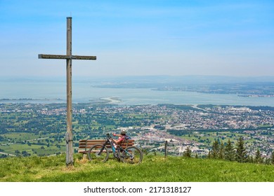 nice senior woman riding her electric mountain bike  in the Bregenzer Wald mountain range above Bregenz and Lake of Constance in Vorarlberg, Austria - Shutterstock ID 2171318127