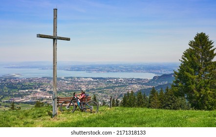 nice senior woman riding her electric mountain bike  in the Bregenzer Wald mountain range above Bregenz and Lake of Constance in Vorarlberg, Austria - Shutterstock ID 2171318133