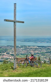 nice senior woman riding her electric mountain bike  in the Bregenzer Wald mountain range above Bregenz and Lake of Constance in Vorarlberg, Austria - Shutterstock ID 2171318139