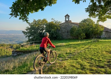 nice senior woman riding her electric mountain  in the Casentno hills near Arezzo,Tuscany , Italy - Powered by Shutterstock