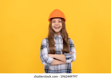 Nice Smile. Building And Construction Concept. Happy Child Worker Wear Hardhat. Childhood Development. Happy Labour Day. Future Career. Teen Girl In Helmet. Builder Kid In Checkered Shirt.