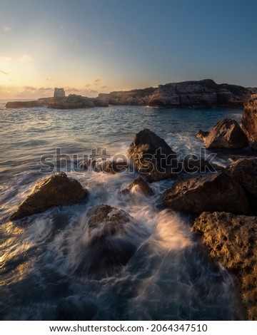 Similar – Image, Stock Photo Rocky cliff with sunset on the horizon