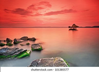 Nice sunset with rocks in the foreground