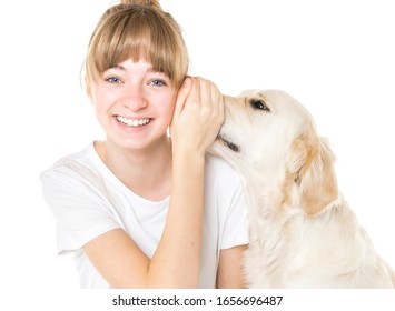 A Nice teen woman and her beautiful Golden Retriever dog over white background - Powered by Shutterstock