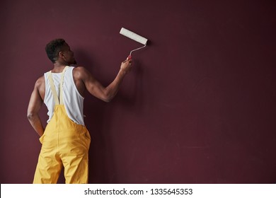 1,627 African man painting wall Images, Stock Photos & Vectors