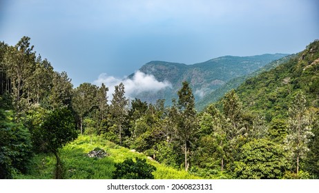 A nice view of a mountain with clouds. Kiliyur Falls is a waterfall in the Shervaroyan hill range in the Eastern Ghats, Tamil Nadu, India.	 - Shutterstock ID 2060823131
