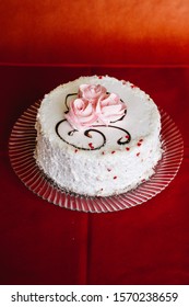 Nice White Vanilla Cake With A Missing Piece On A Glass Plate