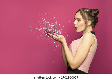 Nice Woman Blowing Colorful Confetti