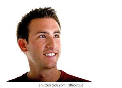 A Nice Young Man Smiling And Looking Left