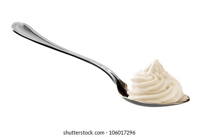 Nicely Curled Whipped Cream On A Spoon