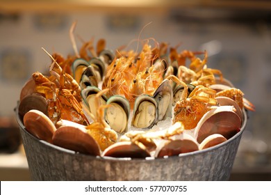 Nicely Placed Shrimp, Mussels, Seafood On Ice In A Bucket. Dining.