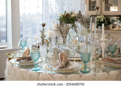 Nicely Set Table For Dinner By The Window. Wedding Table Served In White And Blue Colors