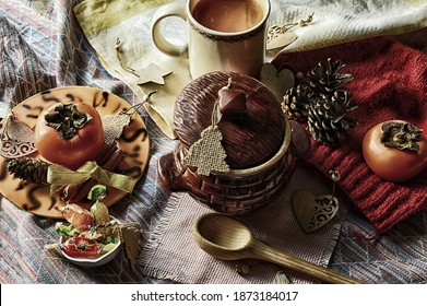 Nicely Set Table For Dinner. Hot Soup In A Clay Pot Is Waiting For Guests. Photos In Vintage Style. View From Above