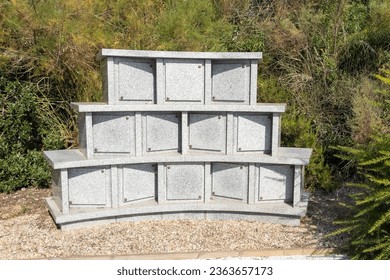 Niches in a cemetery prepared new empty place for funeral service - Powered by Shutterstock