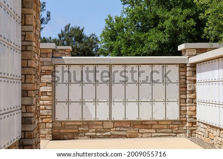 Niches on a Columbarium for cinerary urns at a cemetery.
