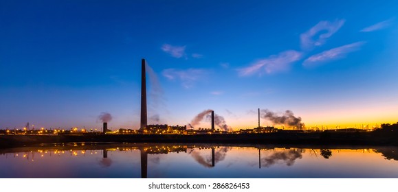 Nickel Plant With Graduated Sunrise Sky As Background